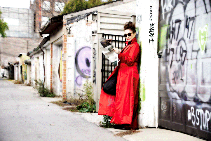 Holly Cole in a red coat